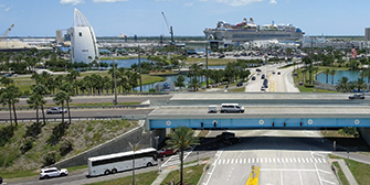 Aerial image showing cars driving through Port Canaveral.