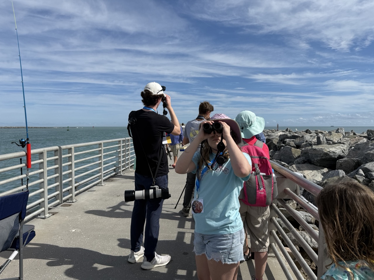 ChildrenlookthroughbinocularsbirdwatchingatJettyPark