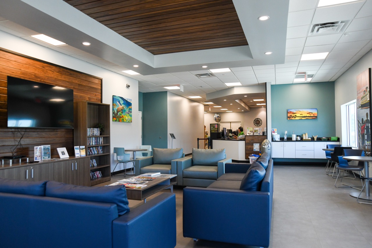InsidetheJettyParkCampStoretherearecouchestowatchmoviesonandafreecoffeebar