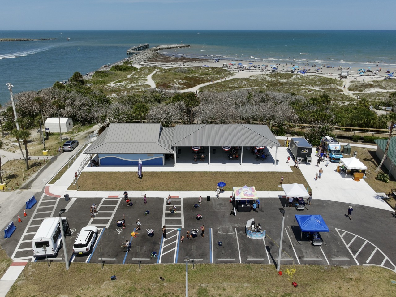 TheJettyParkpavilionandrestroomsarepicturedfromaboveshowingthebeachjettyandpierinthebackground